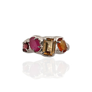 Multi gemstone statement ring in rhodium plated 925 sterling silver featuring citrine, orange tourmaline, ruby and garnet. Tarnish-resistant artisan ring for everyday wear. Available in US size 7 (UK N) with resizing options.