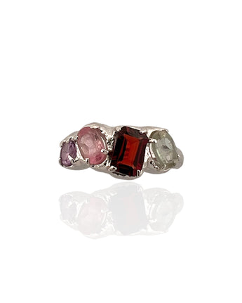 Multi gemstone statement ring in rhodium plated 925 sterling silver featuring garnet, pink tourmaline, green amethyst and amethyst. Tarnish-resistant artisan ring for everyday wear. Available in US size 7.5 (UK P) with resizing options.