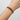 Gold vermeil bracelet with rough-cut garnet stones. Adjustable 16–17 cm (6.3–6.7 in), hammered finish, tarnish-resistant, perfect for stacking and everyday wear.