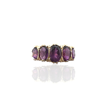 Front view of Art Deco inspired ring set with five oval purple amethysts