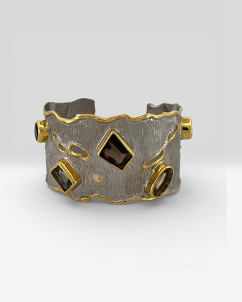 Luxury 18K gold vermeil cuff bracelet on 925 sterling silver featuring smoky quartz, green amethyst, lemon quartz, orange tourmaline and amethyst. Handmade statement gemstone cuff.
URL Handle