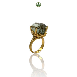 A green amethyst peridot ring with a gold vermeil band, displayed against a white background.
