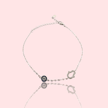 Material: 925 Sterling Silver or 18K Gold Vermeil
• Finish: High polish, tarnish resistant
• Charm: Blue Evil Eye & Pavé Hamsa
• Style: Minimalist / Dainty / Stacking
• Closure: Adjustable clasp
• Occasion: Everyday wear, gifting