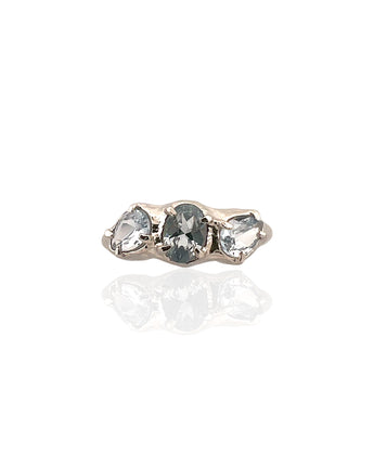 Trio aquamarine ring in rhodium plated 925 sterling silver featuring natural aquamarine gemstones. Elegant and minimal ring for everyday wear. Available in US size 6.5 (UK M) with resizing options.