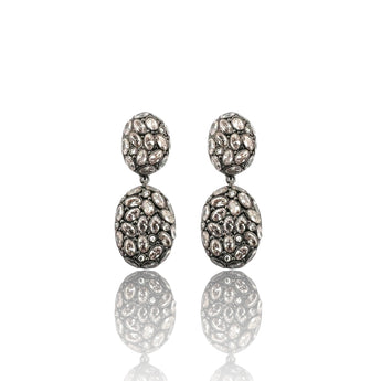 Luxury black rhodium sterling silver statement earrings set with AAA zirconia. Bold sparkle drop earrings perfect for evening & bridal wear.