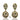 Pair of gold earrings with green gemstones on a white background