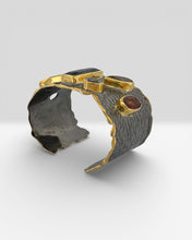 Luxury black rhodium and 18K gold plated cuff bracelet on 925 sterling silver featuring citrine, amethyst, ruby, kyanite, rutilated quartz, blue topaz and orange tourmaline.