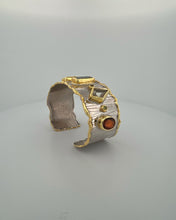 Luxury 18K gold vermeil cuff bracelet set on 925 sterling silver featuring kyanite, lemon quartz, London blue topaz, green amethyst and orange tourmaline. Handmade statement gemstone cuff.