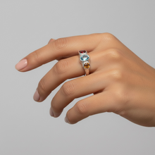 Trio gemstone ring in rhodium plated 925 sterling silver featuring Swiss blue topaz, red tourmaline and citrine. Elegant and colourful ring for everyday wear. Available in US size 7.5 (UK P) with resizing options.