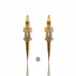 Elegant crocodile earrings crafted in 18K gold vermeil or sterling silver with sparkling baguette-cut zirconia. Unique statement jewelry perfect for layering and everyday luxury.
