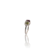 Raw Peridot & Garnet Organic Sterling Silver Ring

A bold celebration of natural colour and texture.

This handcrafted sterling silver ring features natural rough peridot and deep red garnet stones, set in an organic handmade silver setting that enhances the raw beauty of each gemstone.

The vibrant green of peridot contrasts beautifully with the rich crimson garnet, creating a striking statement piece that feels both earthy and luxurious.

Each stone is left in its natural rough form, making every ring com