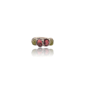 Raw Peridot & Garnet Organic Sterling Silver Ring

A bold celebration of natural colour and texture.

This handcrafted sterling silver ring features natural rough peridot and deep red garnet stones, set in an organic handmade silver setting that enhances the raw beauty of each gemstone.

The vibrant green of peridot contrasts beautifully with the rich crimson garnet, creating a striking statement piece that feels both earthy and luxurious.

Each stone is left in its natural rough form, making every ring com