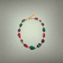 Shop a luxurious multicolor gemstone bracelet featuring London Topaz, Opal, Amethyst and Pink Tourmaline set in 18K gold vermeil over sterling silver. Adjustable, tarnish-free and perfect for everyday elegance.