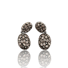Luxury black rhodium sterling silver statement earrings set with AAA zirconia. Bold sparkle drop earrings perfect for evening & bridal wear.