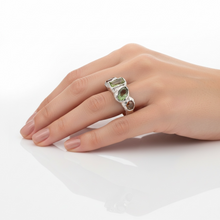 Multi gemstone statement ring in rhodium plated 925 sterling silver featuring peridot, orange tourmaline, green tourmaline and citrine. Tarnish-resistant artisan ring for everyday wear. Available in US size 6.5 (UK M) with resizing options.