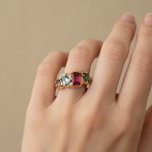 Shop this 14K gold vermeil multi gemstone ring with emerald, garnet, blue topaz and amethyst. Tarnish-resistant, stackable, and perfect for everyday wear.