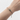Discover an alligator bracelet with green baguette zirconia in 14K gold vermeil or rhodium-plated 925 sterling silver. Adjustable to fit 16–18 cm wrists.