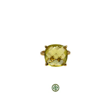 A Lemon Quartz ring with a gold band and yellow plating, featuring a faceted square-shaped stone.