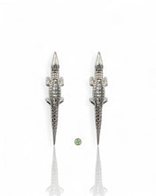 Elegant crocodile earrings crafted in 18K gold vermeil or sterling silver with sparkling baguette-cut zirconia. Unique statement jewelry perfect for layering and everyday luxury.
