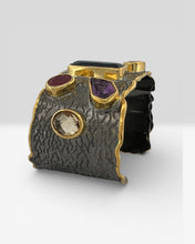 Luxury black rhodium and 18K gold plated cuff bracelet on 925 sterling silver featuring citrine, amethyst, ruby, kyanite, rutilated quartz, blue topaz and orange tourmaline.
