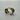 Luxury green amethyst cuff bangle crafted in black rhodium plated 925 sterling silver with thick 18K gold vermeil bezel. Elegant wide statement bracelet adjustable for 16–17 cm wrists.
