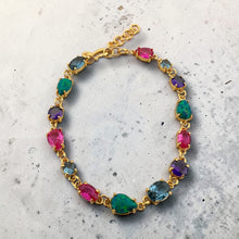 Shop a luxurious multicolor gemstone bracelet featuring London Topaz, Opal, Amethyst and Pink Tourmaline set in 18K gold vermeil over sterling silver. Adjustable, tarnish-free and perfect for everyday elegance.