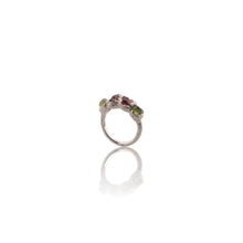 Raw Peridot & Garnet Organic Sterling Silver Ring

A bold celebration of natural colour and texture.

This handcrafted sterling silver ring features natural rough peridot and deep red garnet stones, set in an organic handmade silver setting that enhances the raw beauty of each gemstone.

The vibrant green of peridot contrasts beautifully with the rich crimson garnet, creating a striking statement piece that feels both earthy and luxurious.

Each stone is left in its natural rough form, making every ring com