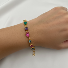 Shop a luxurious multicolor gemstone bracelet featuring London Topaz, Opal, Amethyst and Pink Tourmaline set in 18K gold vermeil over sterling silver. Adjustable, tarnish-free and perfect for everyday elegance.