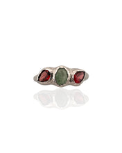 Trio tourmaline ring in rhodium plated 925 sterling silver featuring red and green tourmaline gemstones. Elegant and colourful ring for everyday wear. Available in US size 8 (UK Q) with resizing options.