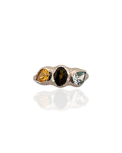 Trio gemstone ring in rhodium plated 925 sterling silver featuring Swiss blue topaz, smoky quartz and citrine. Elegant and colourful ring for everyday wear. Available in US size 5.5 (UK K) with resizing options.