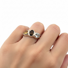 Trio gemstone ring in rhodium plated 925 sterling silver featuring Swiss blue topaz, smoky quartz and citrine. Elegant and colourful ring for everyday wear. Available in US size 5.5 (UK K) with resizing options.