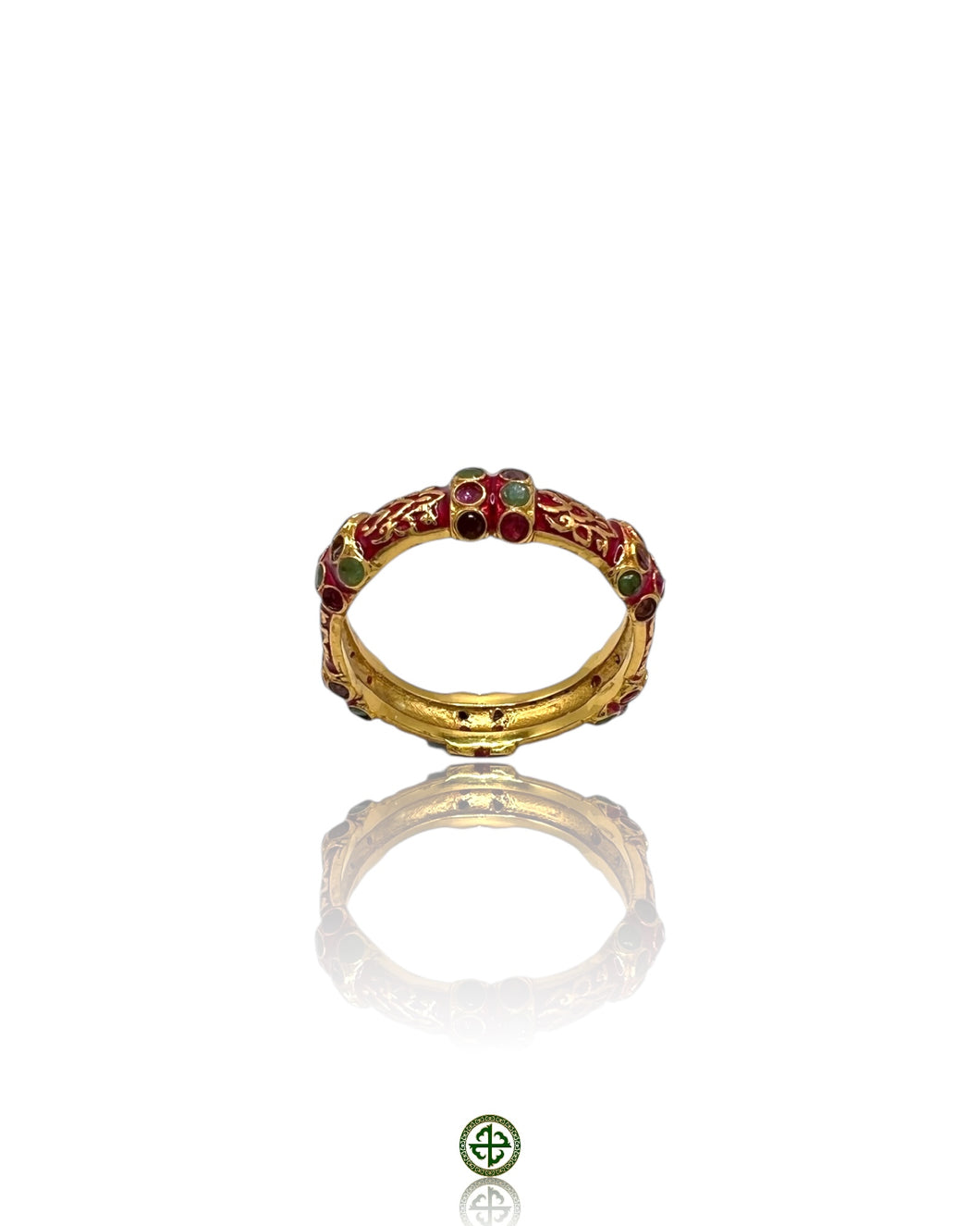 A Stucky-style eternity ring with red enamel and alternating ruby, emerald, and amethyst stones set in gold vermeil on sterling silver.
