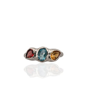 Trio gemstone ring in rhodium plated 925 sterling silver featuring Swiss blue topaz, red tourmaline and citrine. Elegant and colourful ring for everyday wear. Available in US size 7.5 (UK P) with resizing options.