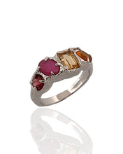 Multi gemstone statement ring in rhodium plated 925 sterling silver featuring citrine, orange tourmaline, ruby and garnet. Tarnish-resistant artisan ring for everyday wear. Available in US size 7 (UK N) with resizing options.