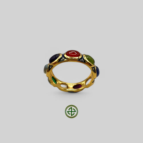 A gold-colored ring featuring a series of multicolored semi-precious gemstones arranged in a nestled pattern with pale blue enamel detailing.