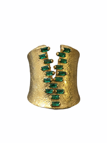 A gold vermeil ring with baguette green zirconia stones set in an oxidized texture design.